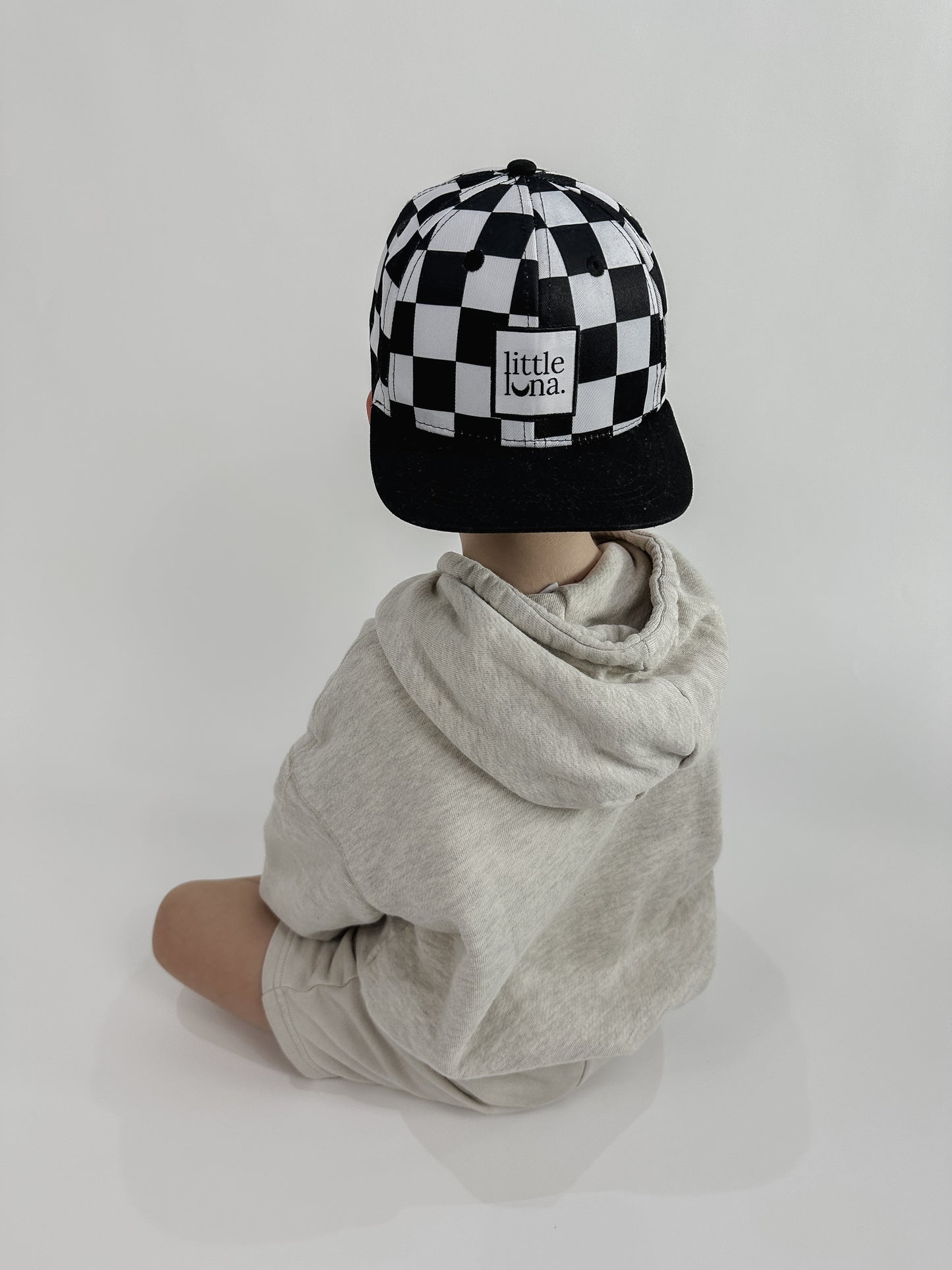 CHECKERBOARD SNAPBACK HAT | BLACK